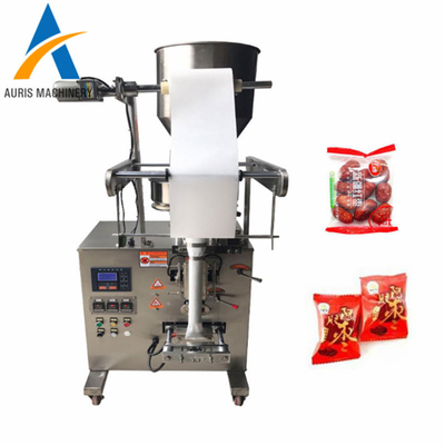 Automatisches Körnchen, welches die Schokoladen-Verpackungsmaschine-Bohnen versiegeln Maschine wiegt